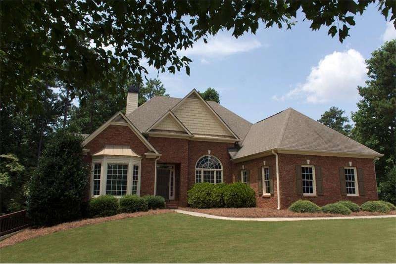 Great curb appeal with large/private lot, side ent