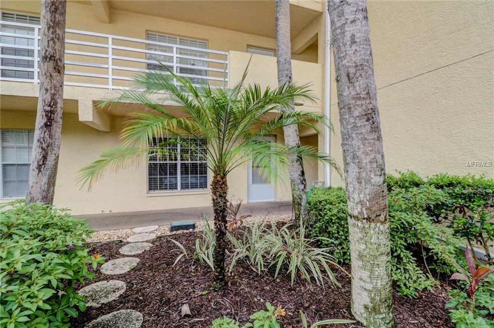 Front door with beautiful landscaped courtyard