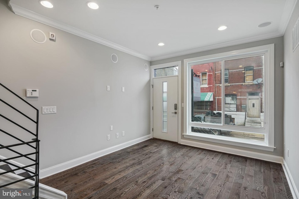 1311 N Myrtlewood St, Philadelphia, PA 19121 - photo 1