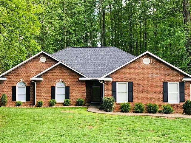 Full brick home on HUGE, private fenced lot with t