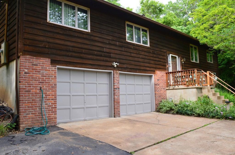 3340 Whitsetts Fork Rd is situated on 6 acres of p