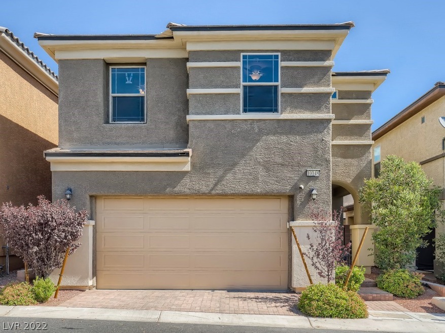 Greeted by mature landscaping, covered entryway &