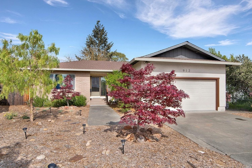 Welcome home.  Front landscaping includes rosemary