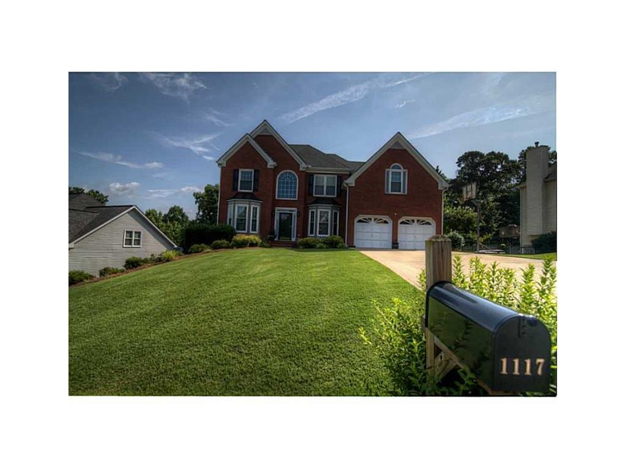 Exterior Front. Well Manicured Landscape