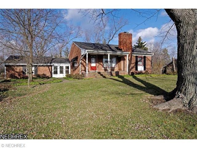 Brick ranch with a full basement. Covered front si