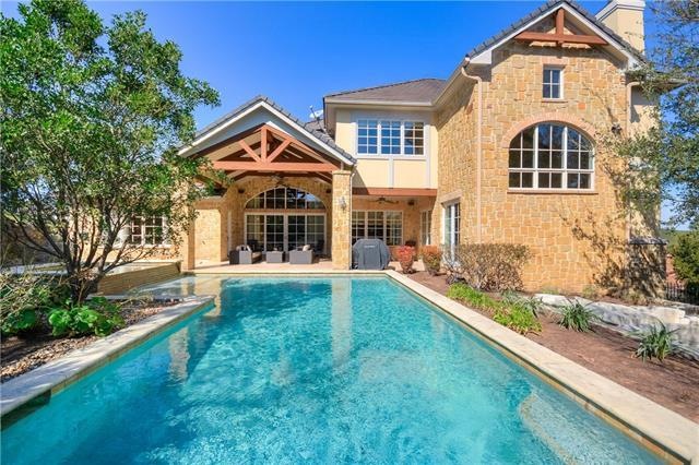 Stunning pool, hot tub and outdoor living space.