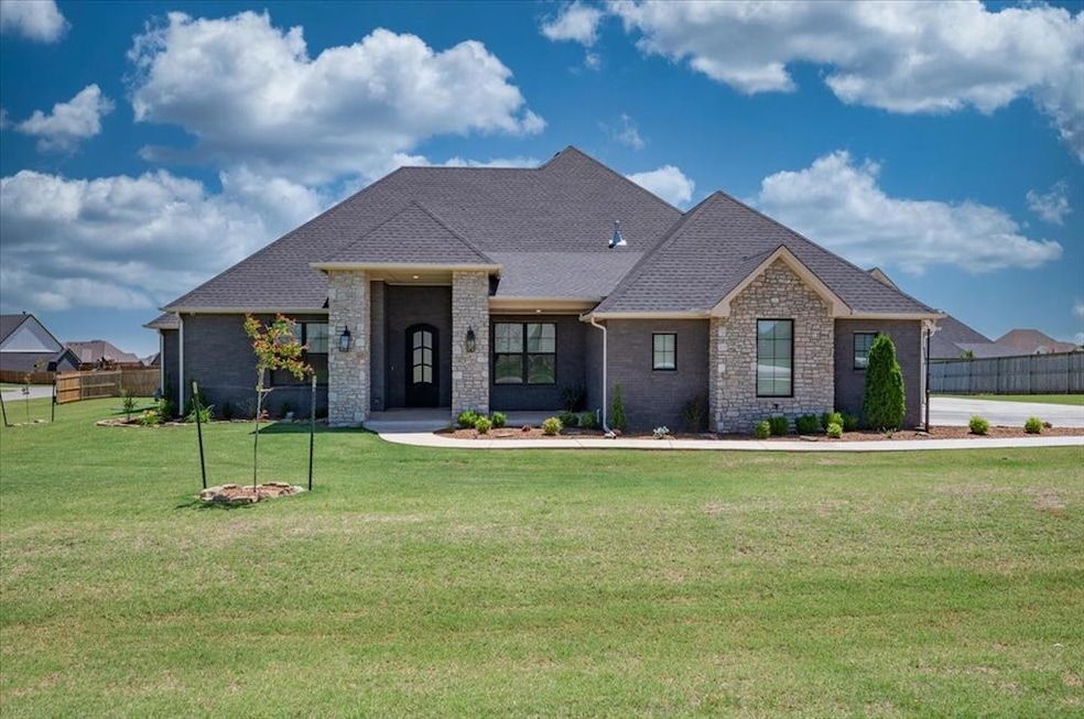 View of front facade featuring a shingled roof
