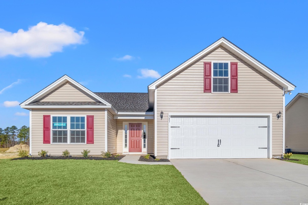 Traditional-style home featuring driveway, a front yard, and roof with shingles