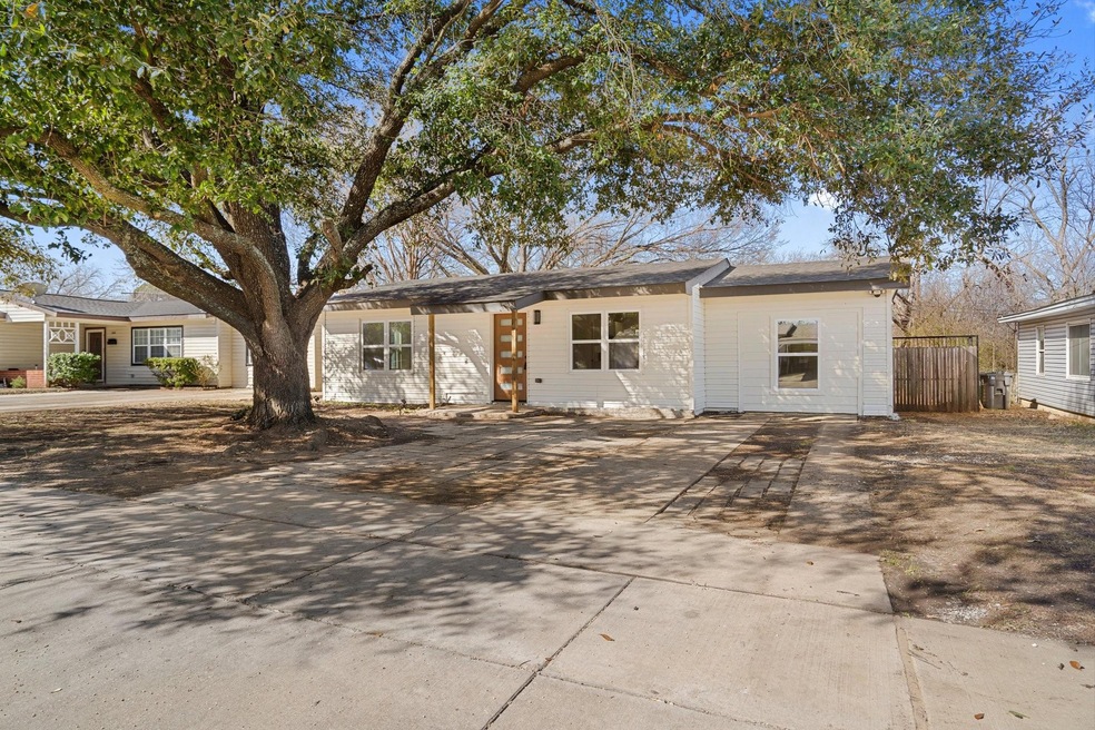 View of front of property with fence