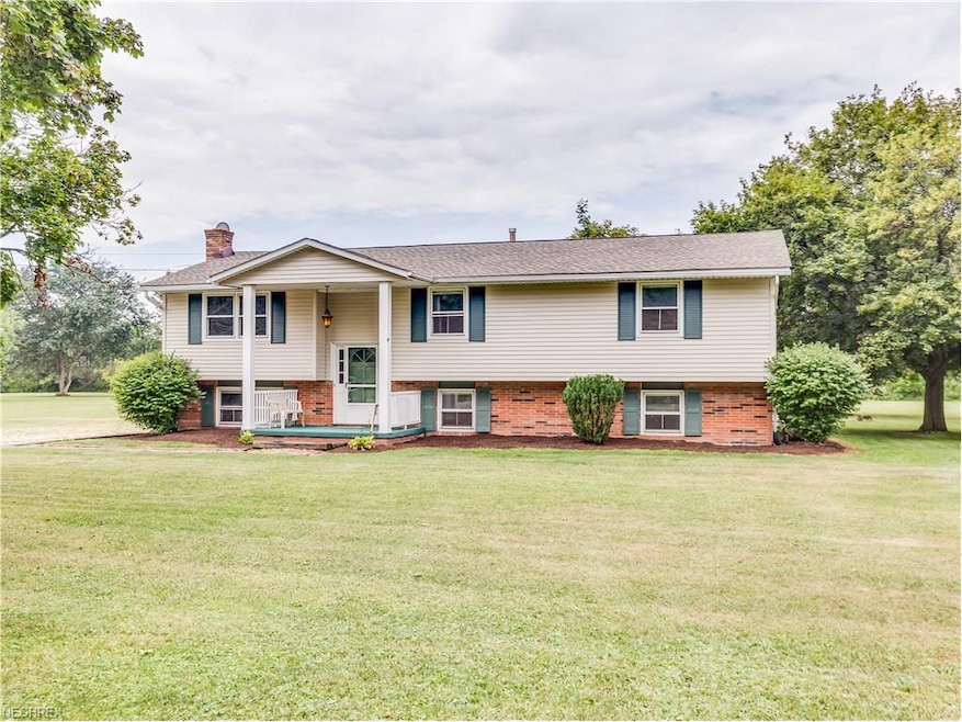 This lovely bi-level home sits on an outstanding 1