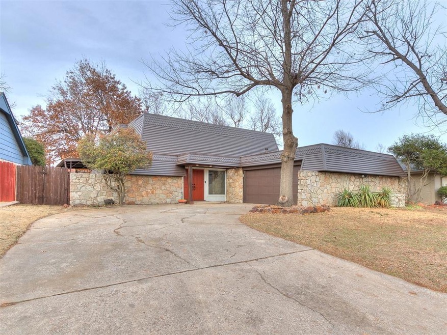 View of front of property featuring stone siding, 