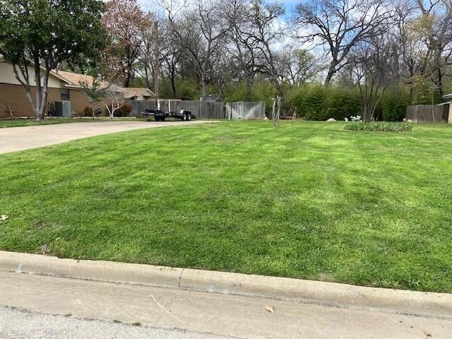 Beautifully kept lot with existing driveway.