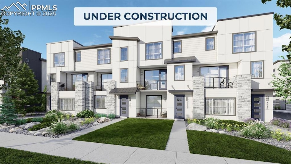 Townhome / multi-family property with stone siding