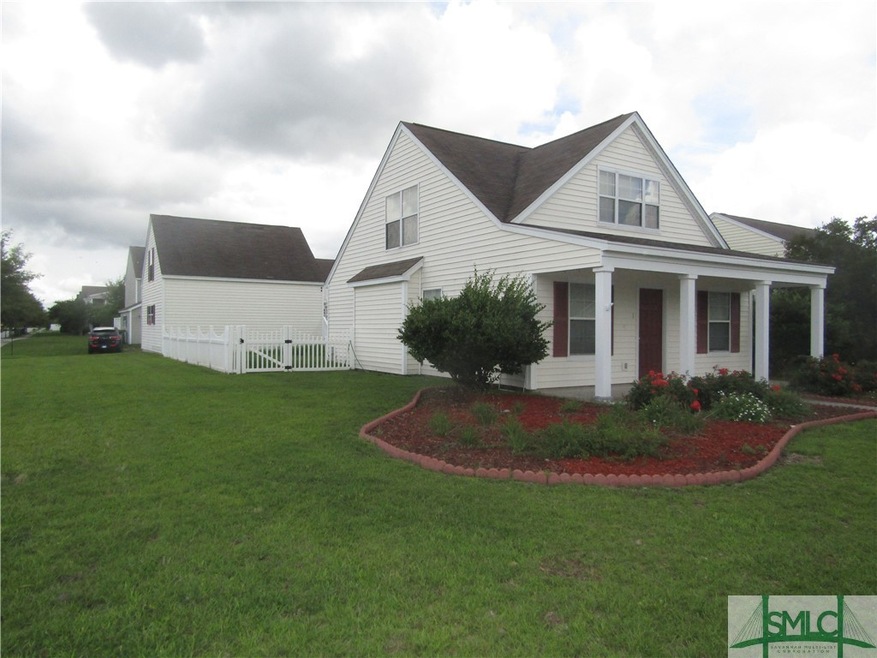 story and a half home with fenced yard and detache