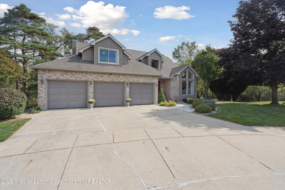 7304 Player's Club Dr, Lansing, MI 48917 - photo 1