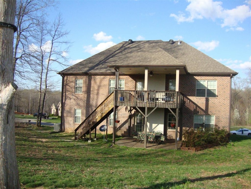 Back view of home 4399 Memory Lane Adams TN 37010