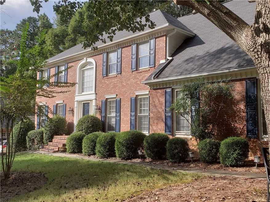 Welcome home to this brick beauty on a cul-de-sac 