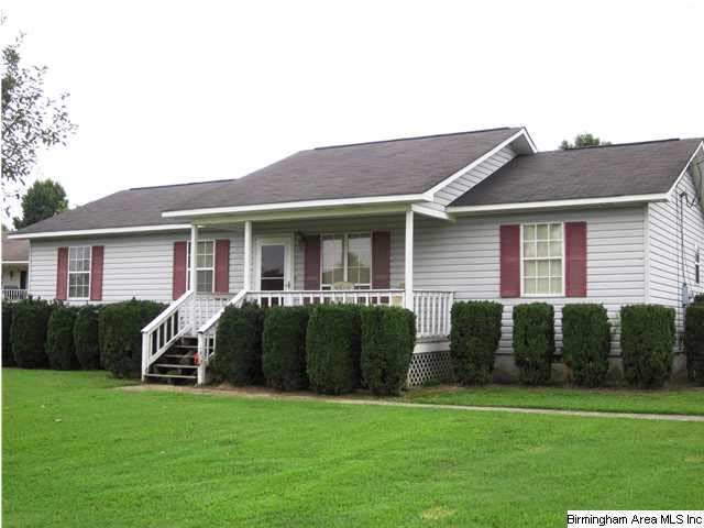 Great home with covered front porch. Easy access t
