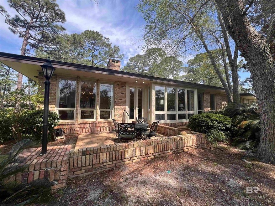 Rear view of house with a patio