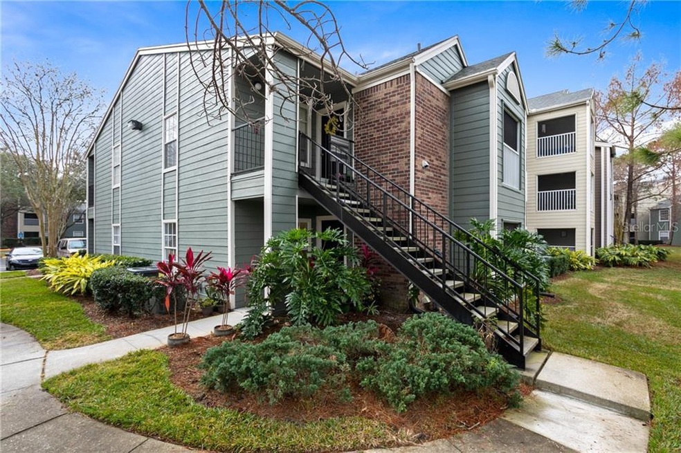 WELCOME HOME! Lush, updated landscaping greets you