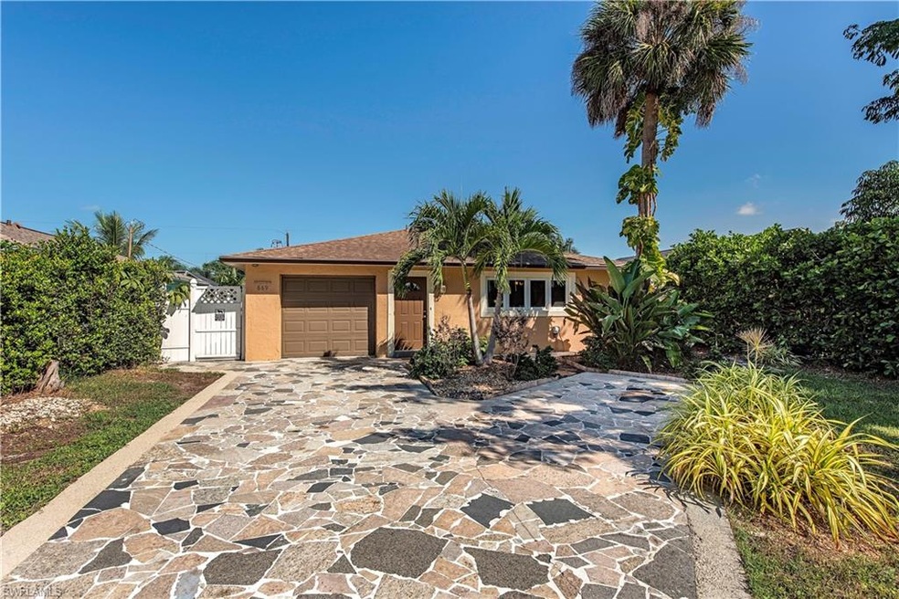Beautiful paved driveway leading to home