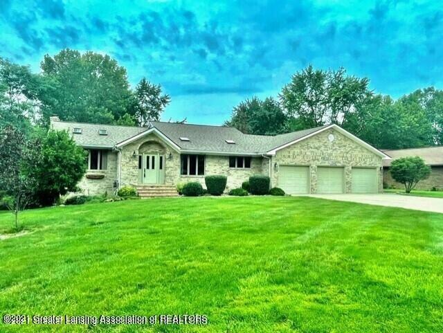 7139 Willow Woods Cir, Lansing, MI 48917 - photo 1