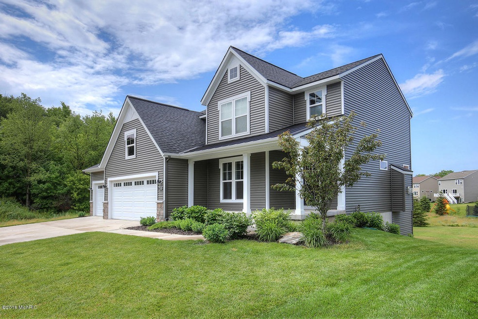 7770 Carlisle Crossings Blvd SW, Byron Center, MI 49315 - photo 1