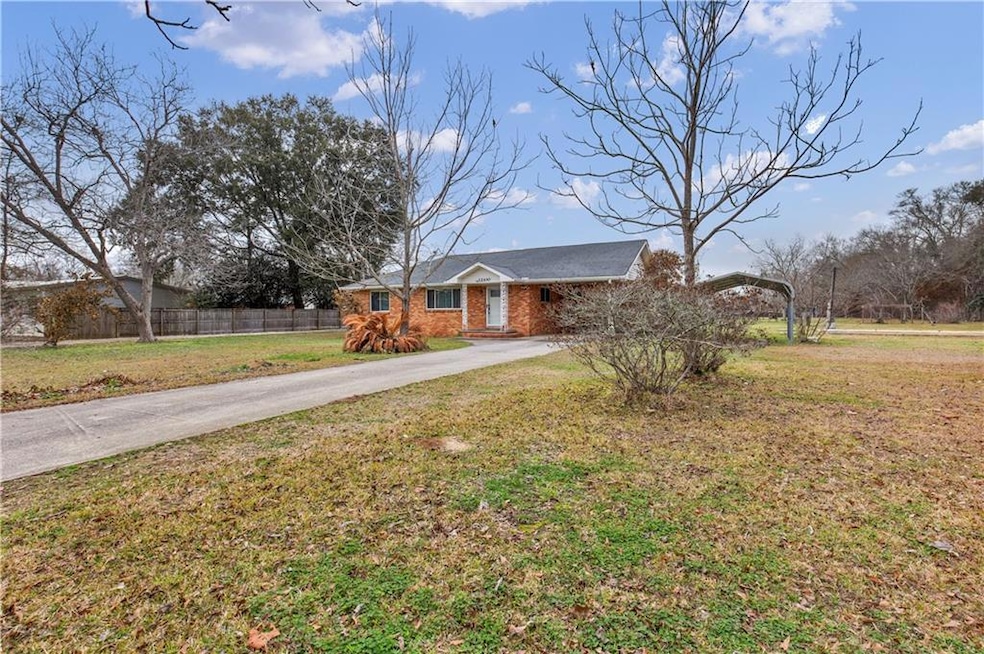 View of front of property with a front lawn