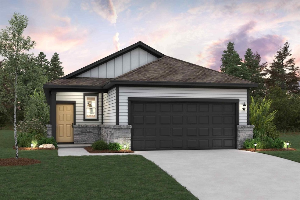 View of front of property with concrete driveway,