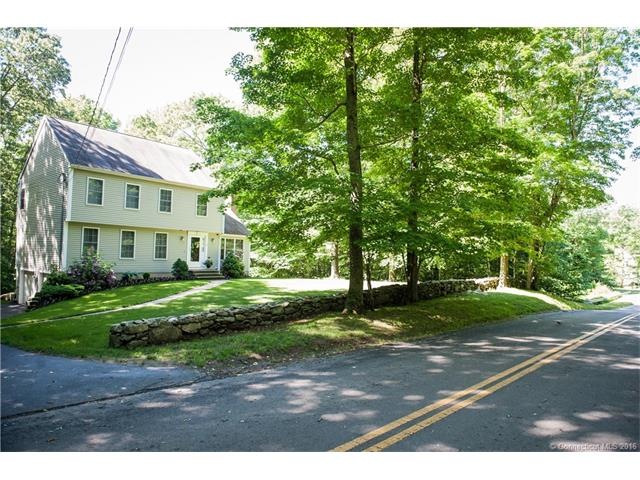 Colonial on 2.7 acres w/ fabulous yard, stream & s