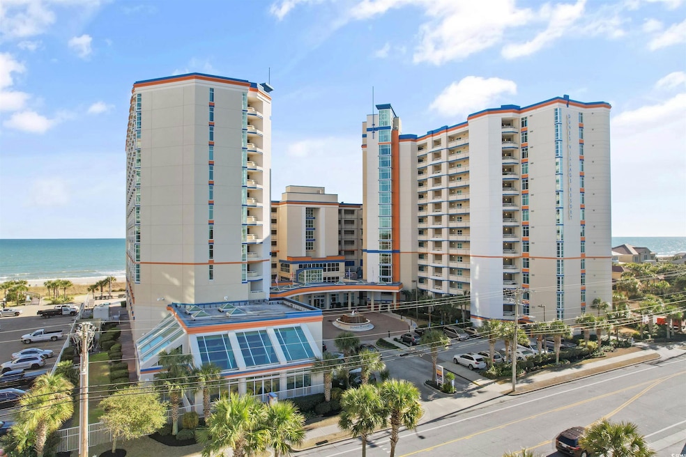 View of building exterior featuring a water view