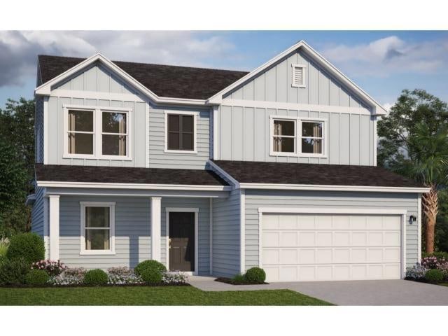 View of front of home with a garage