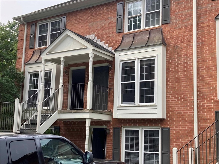 Upstairs unit, #27.  Two parking spots designated