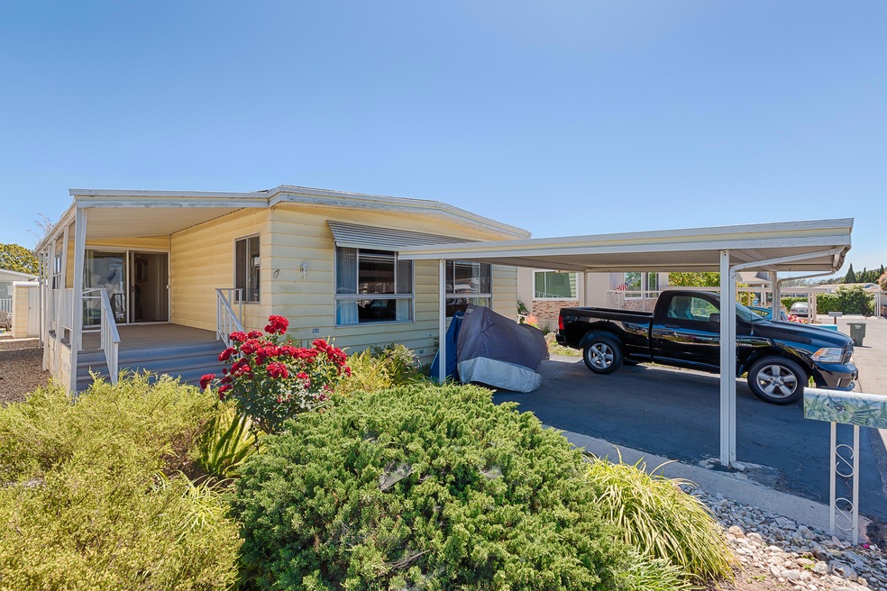 Front with 2-car carport