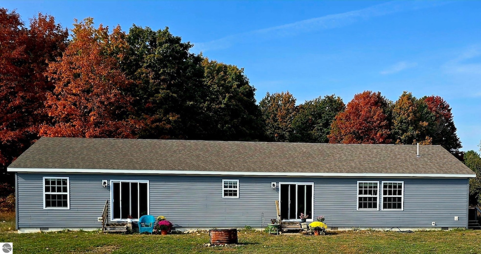 303 Westwood Rd NW, Alden, MI 49612 - photo 1