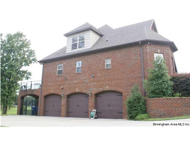 Every man's dream - a 3 car garage with plenty of 