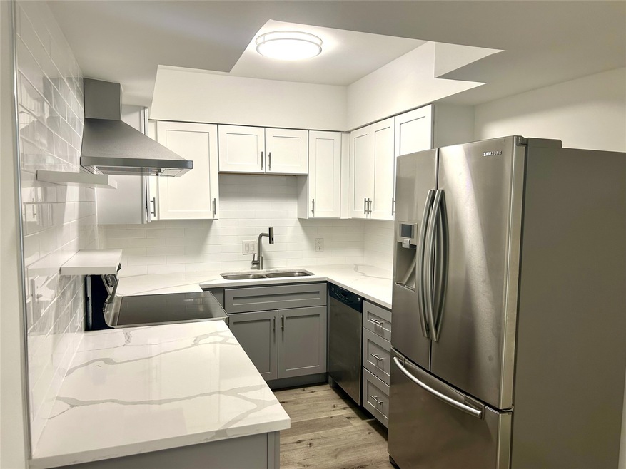 Beautiful modern kitchen with quartz counters - ra
