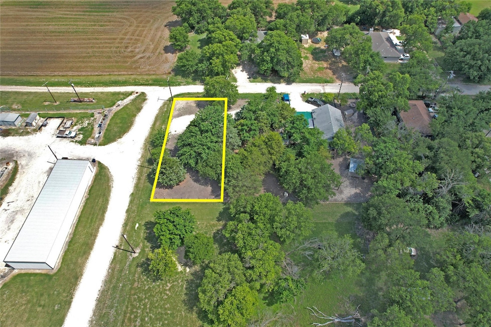 Aerial view of property and surrounding area with