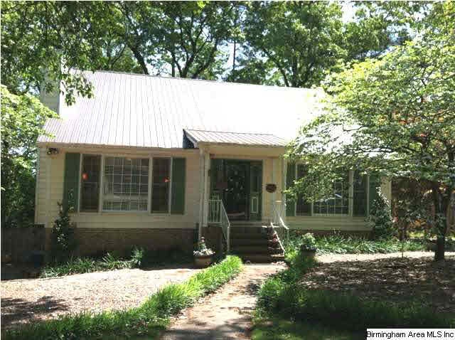 Beautiful curb appeal...home surrounded by mature 