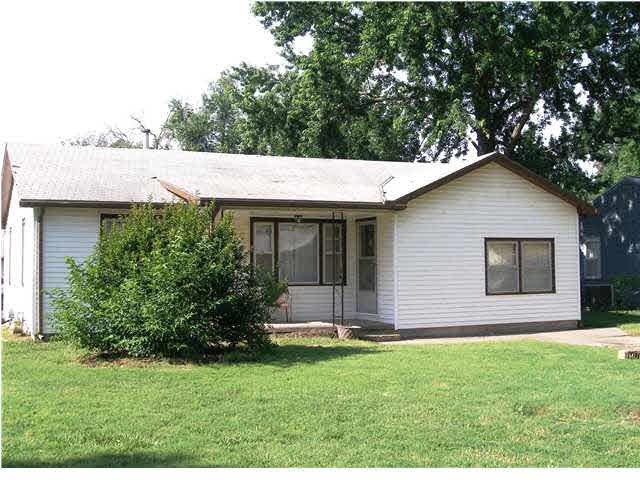 This roomy ranch has easy care permanent siding!