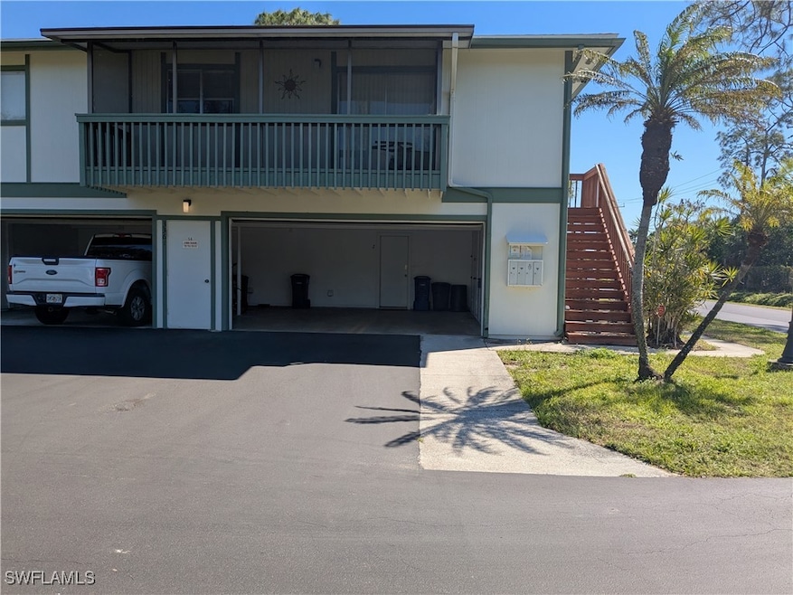 View of front of property  attached garage, and dr