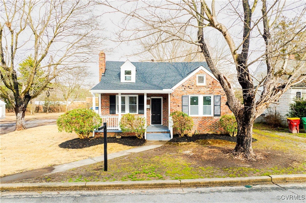 View of front of house with covered porch