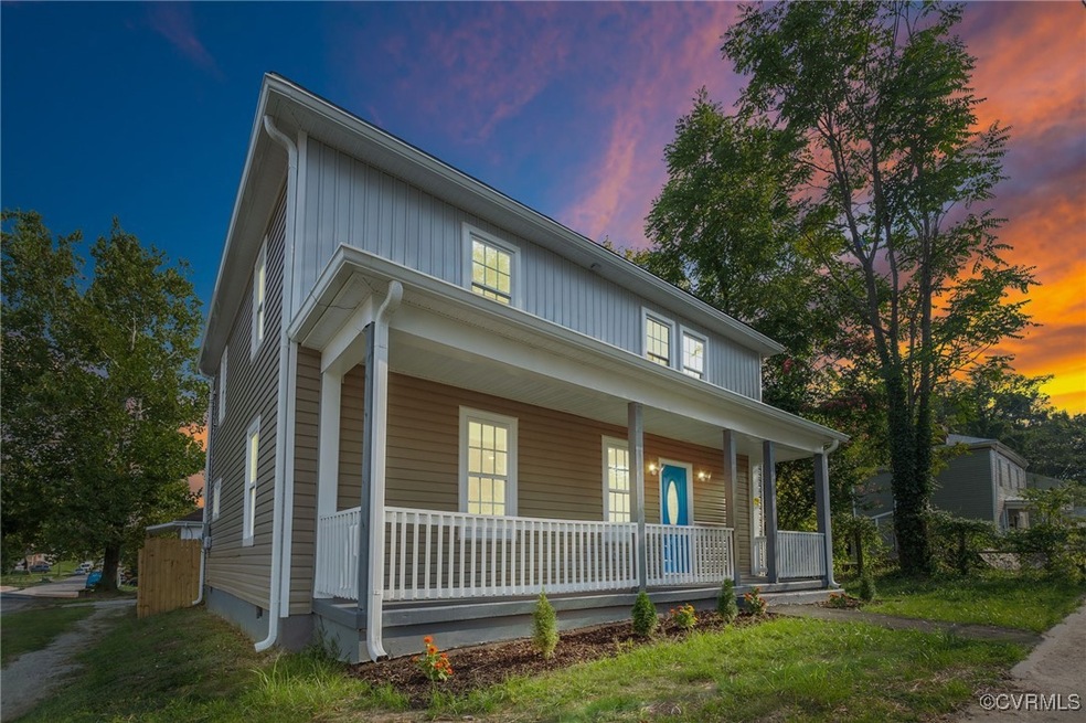 View of front of property with covered porch