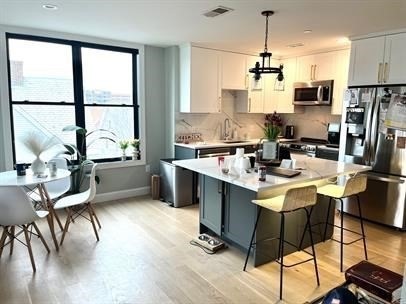 56 Winship St unit 301, Brighton, MA 02135 - photo 1