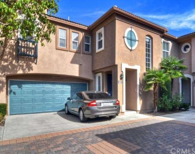 Two car attached garage with a two car driveway