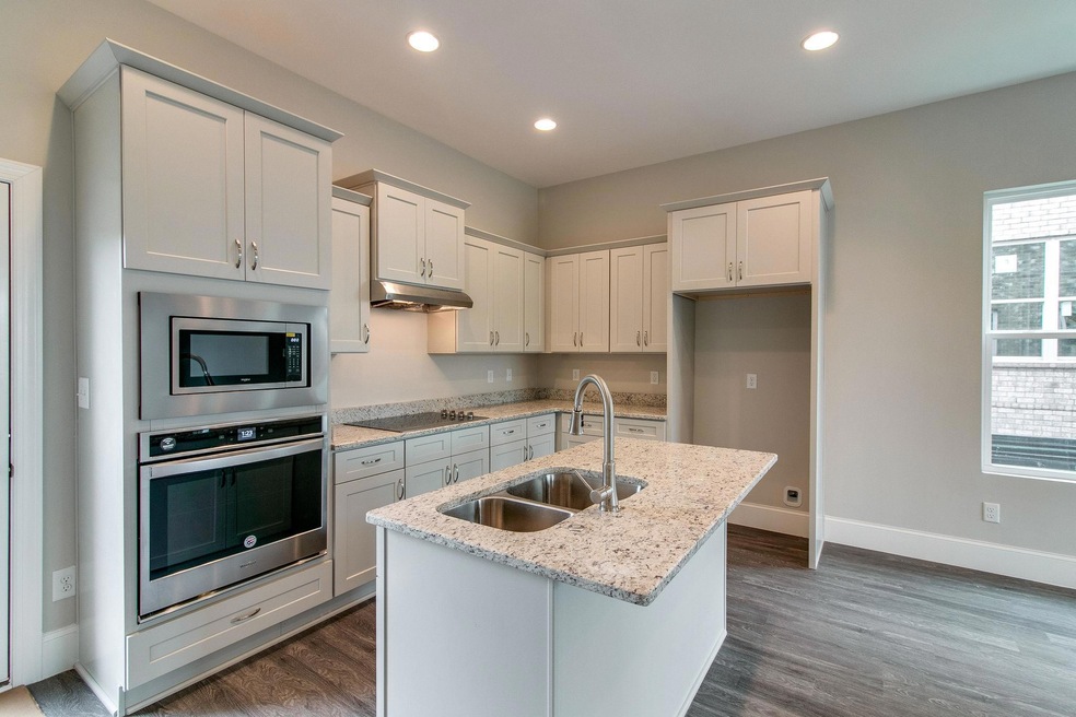 Gourmet Kitchen! Stainless Steel Appliances!  Photo is an example of builder's work. Actual home built may vary.