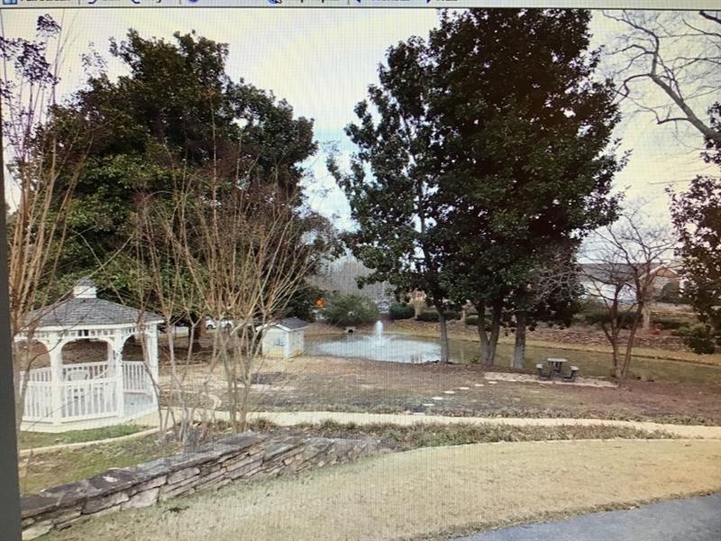 Gazebo, fountain and picnic table in front of 4426