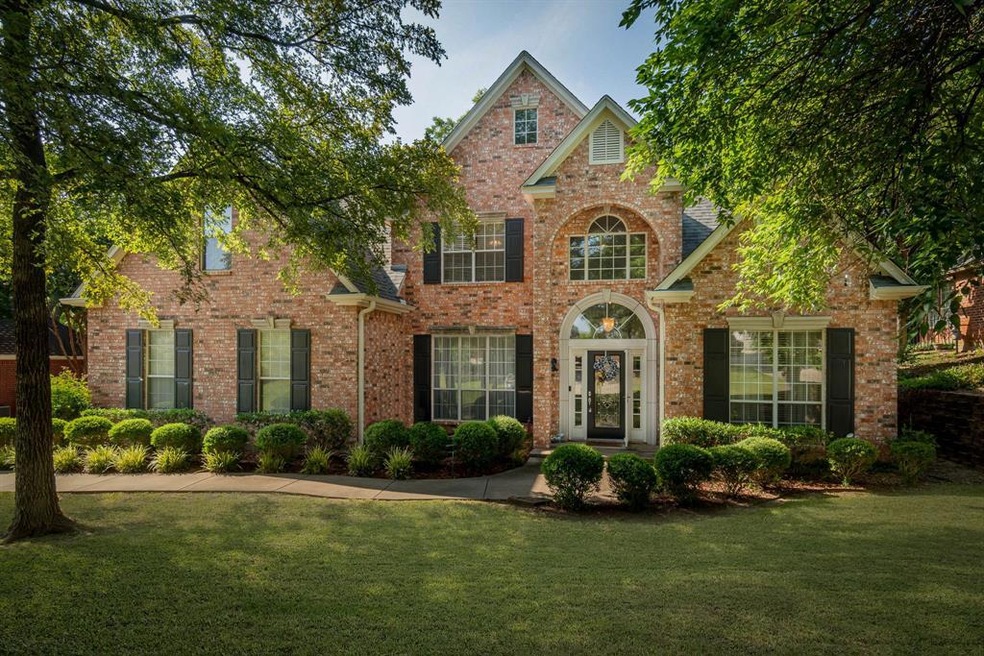 Look at the amazing curb appeal of this custom home