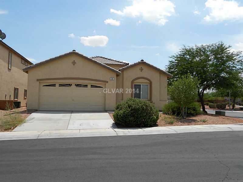 Facade/Exterior Front. Great corner lot home