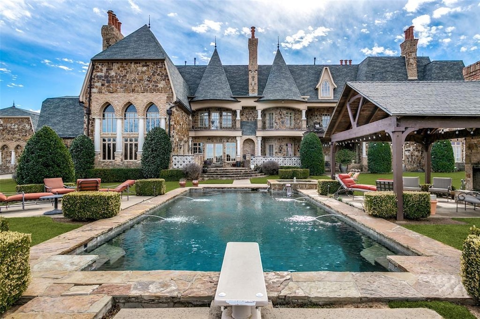 Gorgeous attention to detail with Lueders Stone, multiple balconies, courtyards, beautiful chimneys. A home sure to create a lifetime of wonderful memories